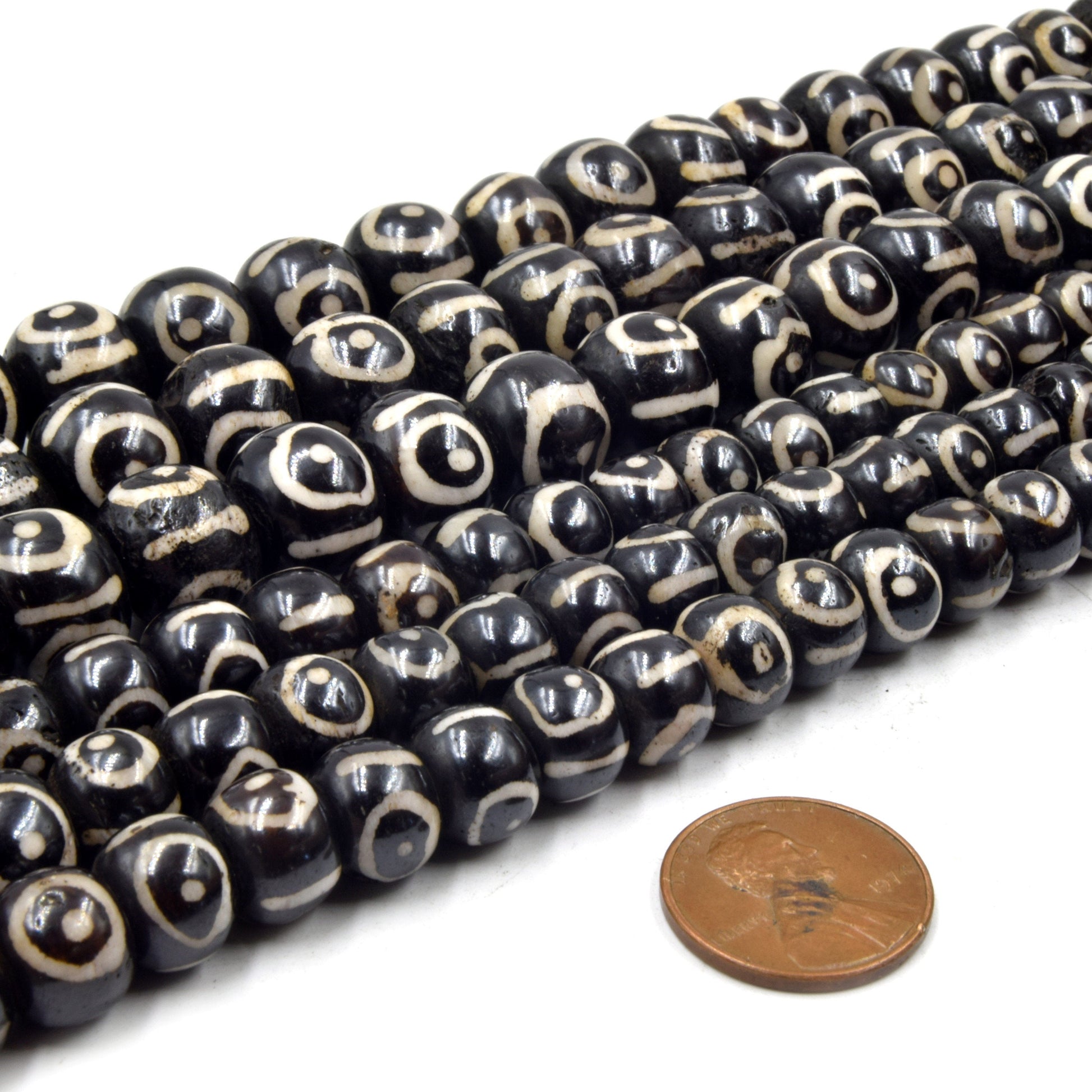 black bullseye bone bead