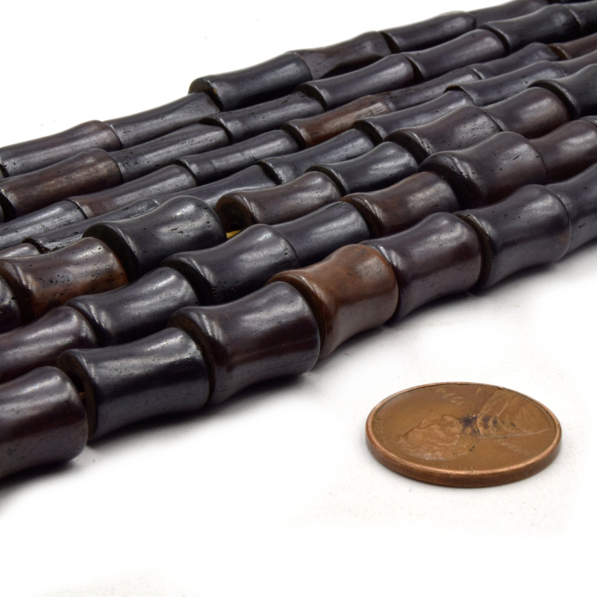 dark brown flared bone beads