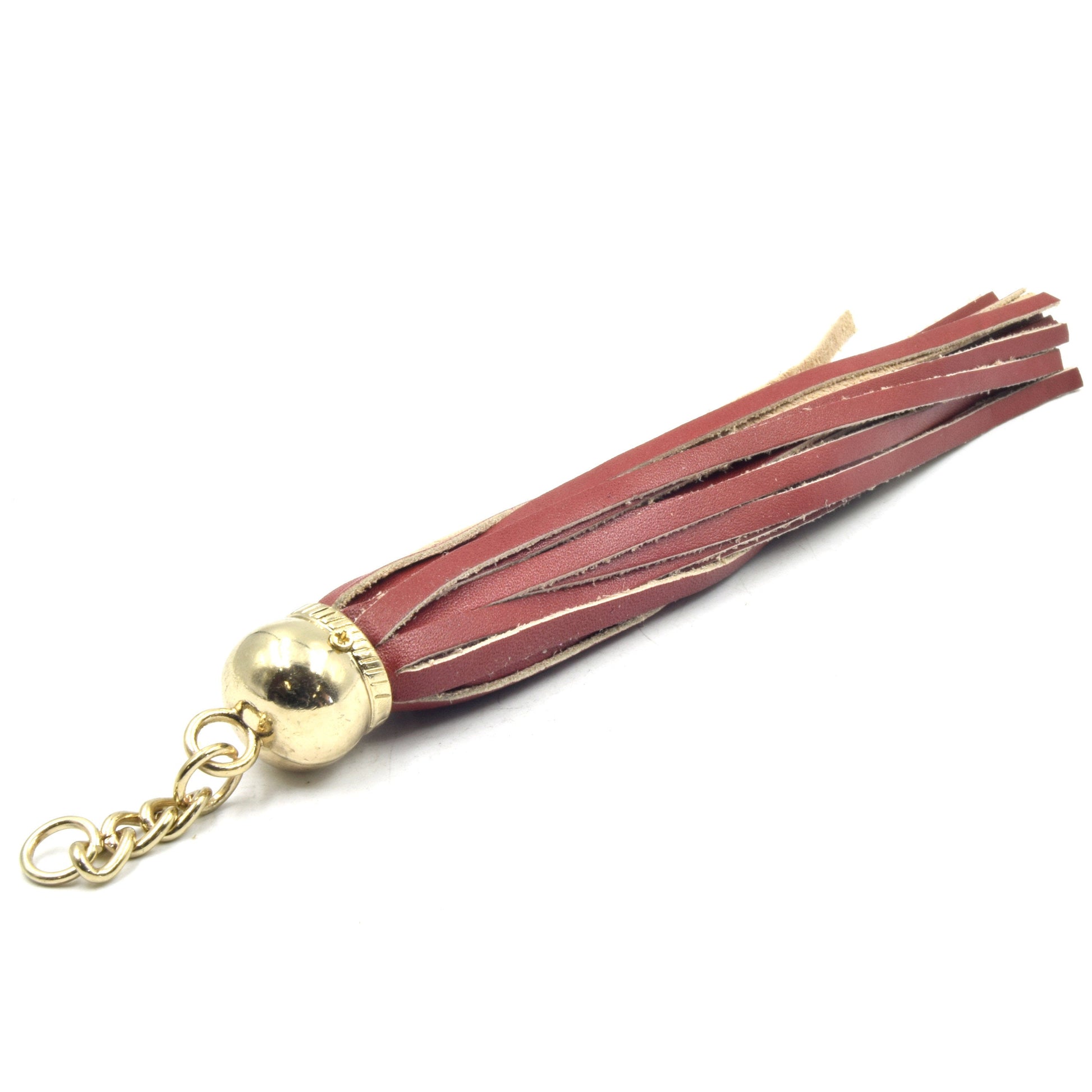 gold dome cap dark red leather tassel