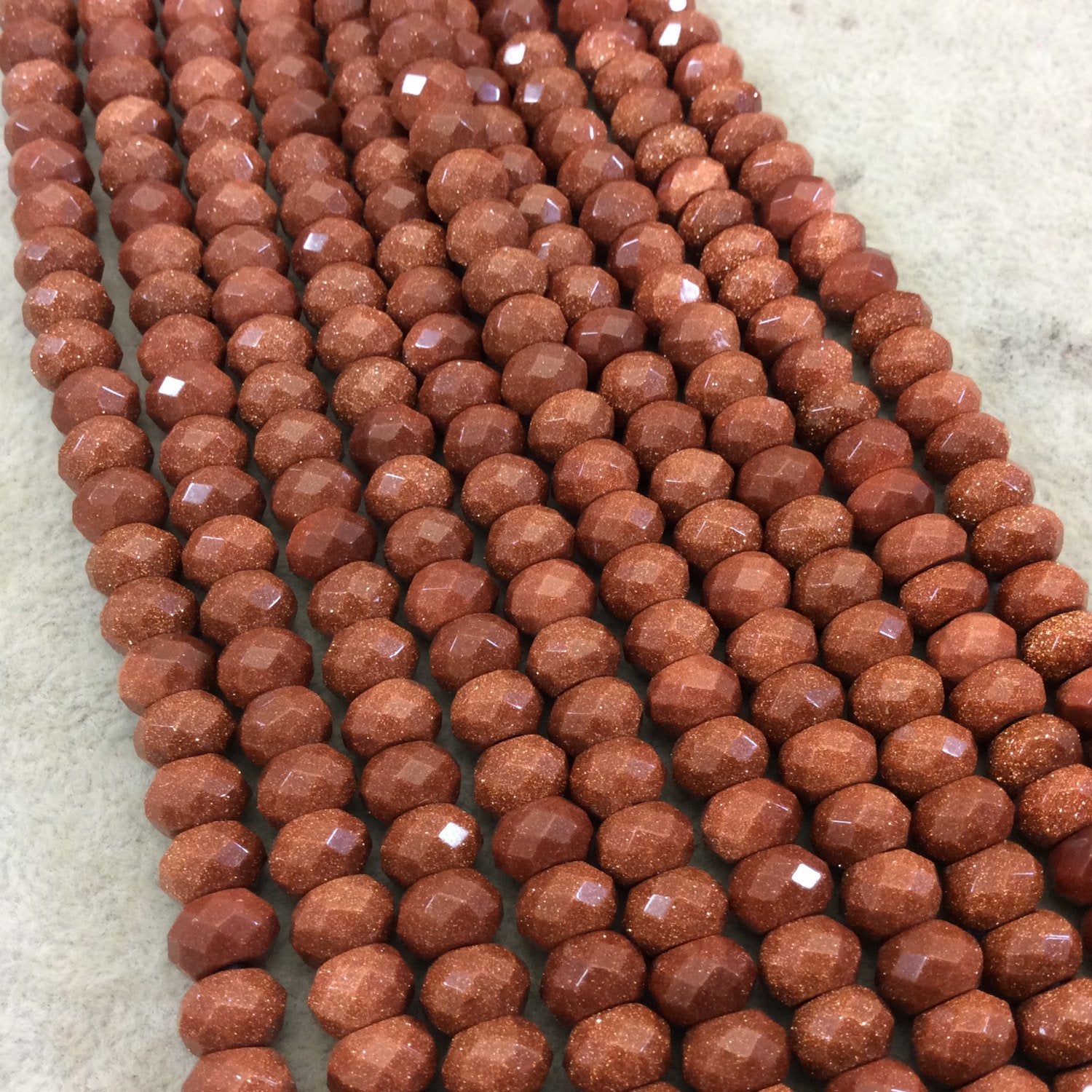 5mm x 8mm Manmade Goldstone (Glass) Faceted Finish Rondelle Beads with 2.5mm Holes - 7.75" Strand (Approx. 36 Beads) - LARGE HOLE BEADS