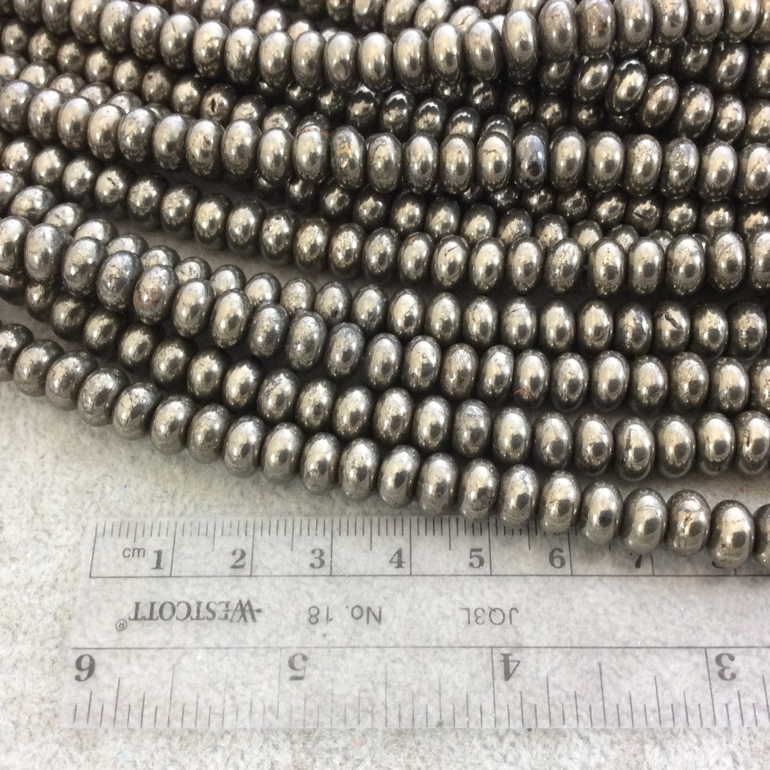 5mm x 8mm Smooth Natural Metallic Pyrite Rondelle/Disc Shaped Beads with 1mm Holes - Sold by 15.75" Strands (Approximately 80 Beads)