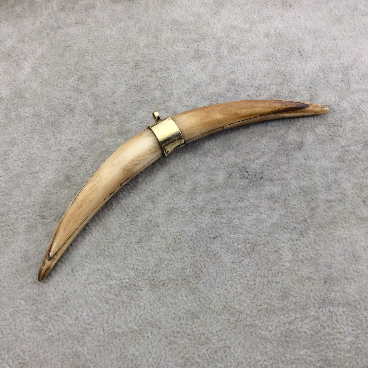 5" Light Brown Long Skinny Banana Tusk Shaped Natural Ox Bone Pendant with Plain Gold Plated Bail - Measuring 12 x 133mm - (TR117-LB)