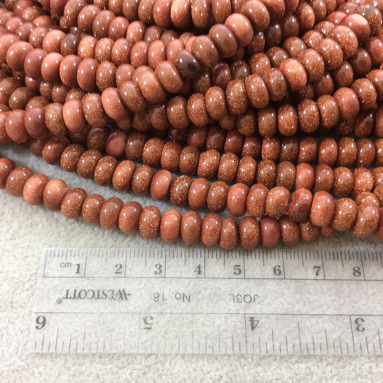 5mm x 8mm Smooth Finish Goldstone (Manmade Glass) Rondelle Shaped Beads with 1mm Holes - Sold by 15.5" Strands (Approximately 80 Beads)