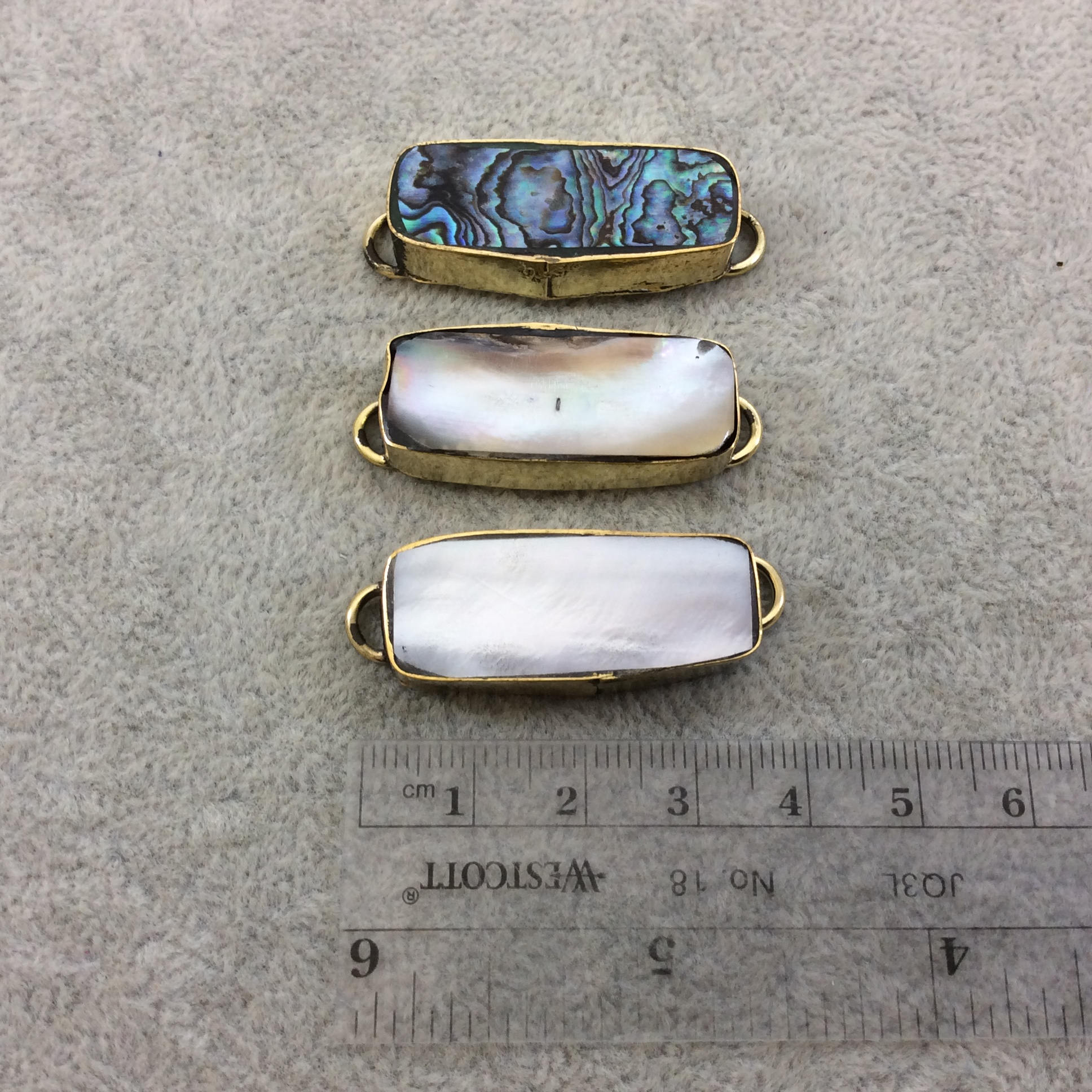 1" Iridescent Rainbow Natural Abalone Shell Long Rectangle Shaped Gold Plated Bezel Connector - Measuring 13mm x 33mm.