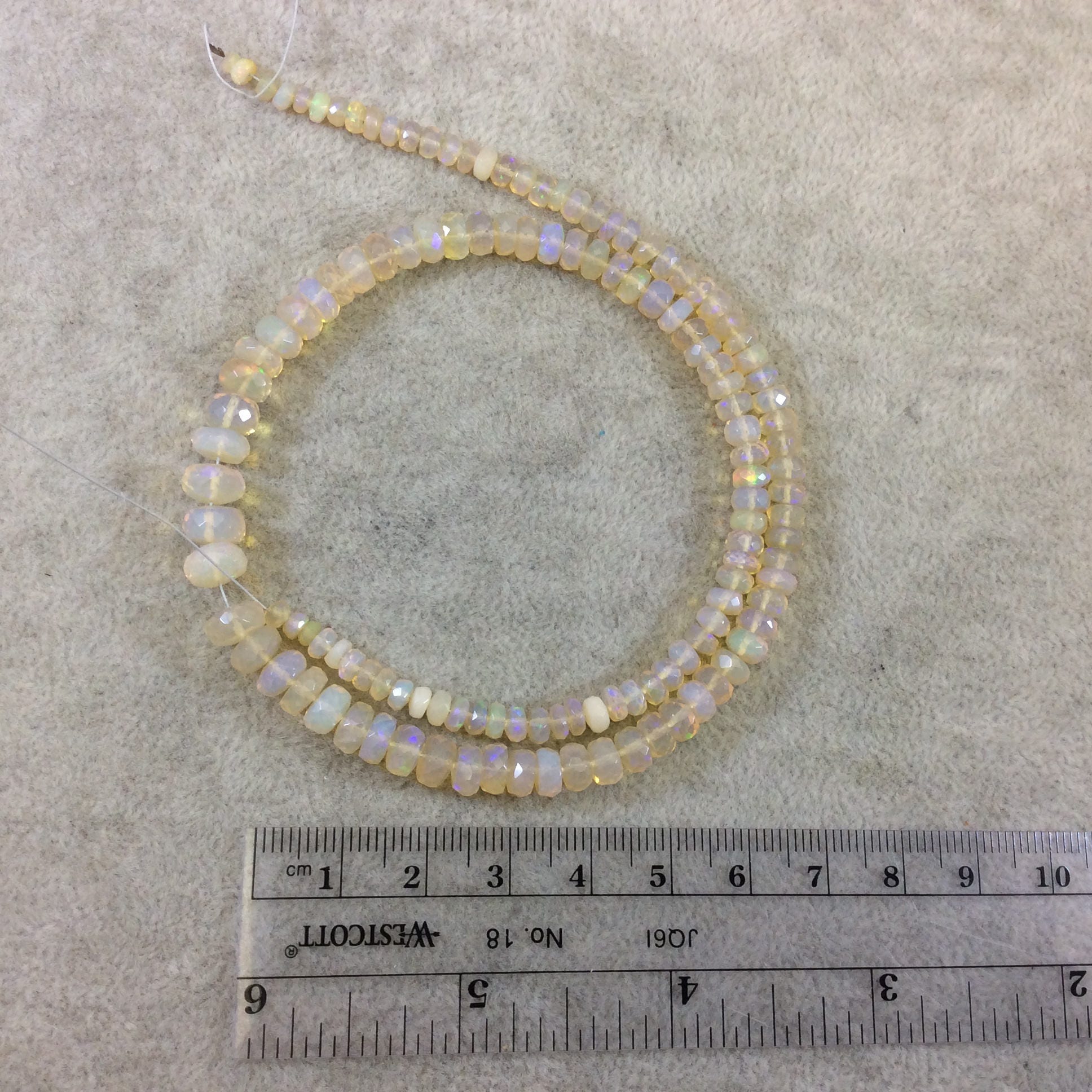 OOAK 3.5-7mm Faceted Transparent Rainbow Ethiopian Opal Graduated Rondelle Beads - 15.5" Strand (131 Beads) - High Quality Indian Gemstone