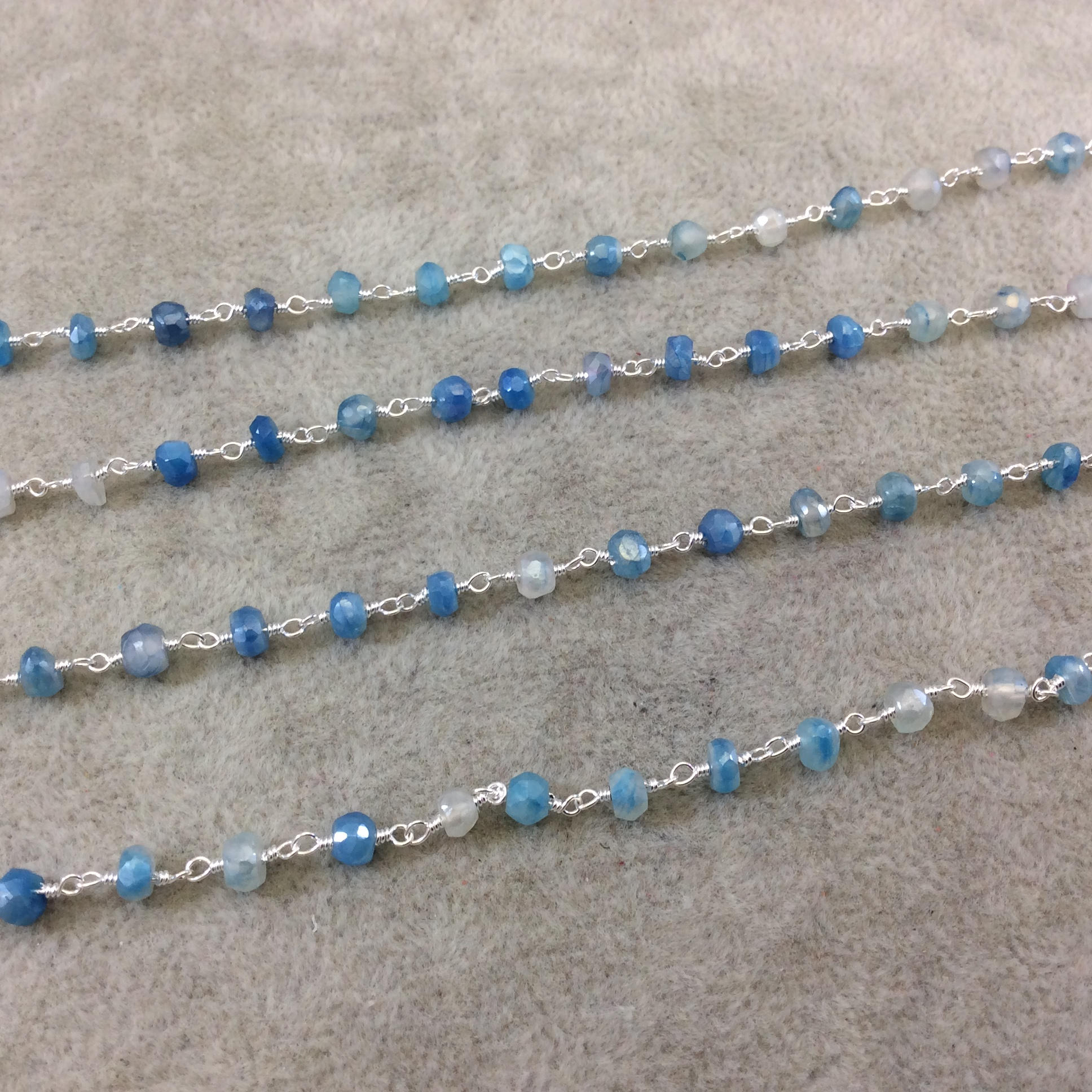 Silver Plated Copper Rosary Chain with Faceted 3-4mm Rondelle Shaped Mystic Coated Mixed Blue/White Moonstone Beads - Sold Per Ft - CH142-SV