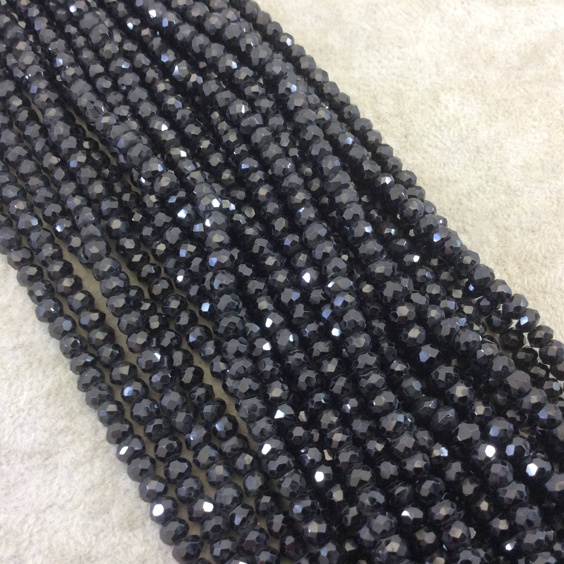 Black Spinel Rondelle Shaped Beads - 5mm Faceted