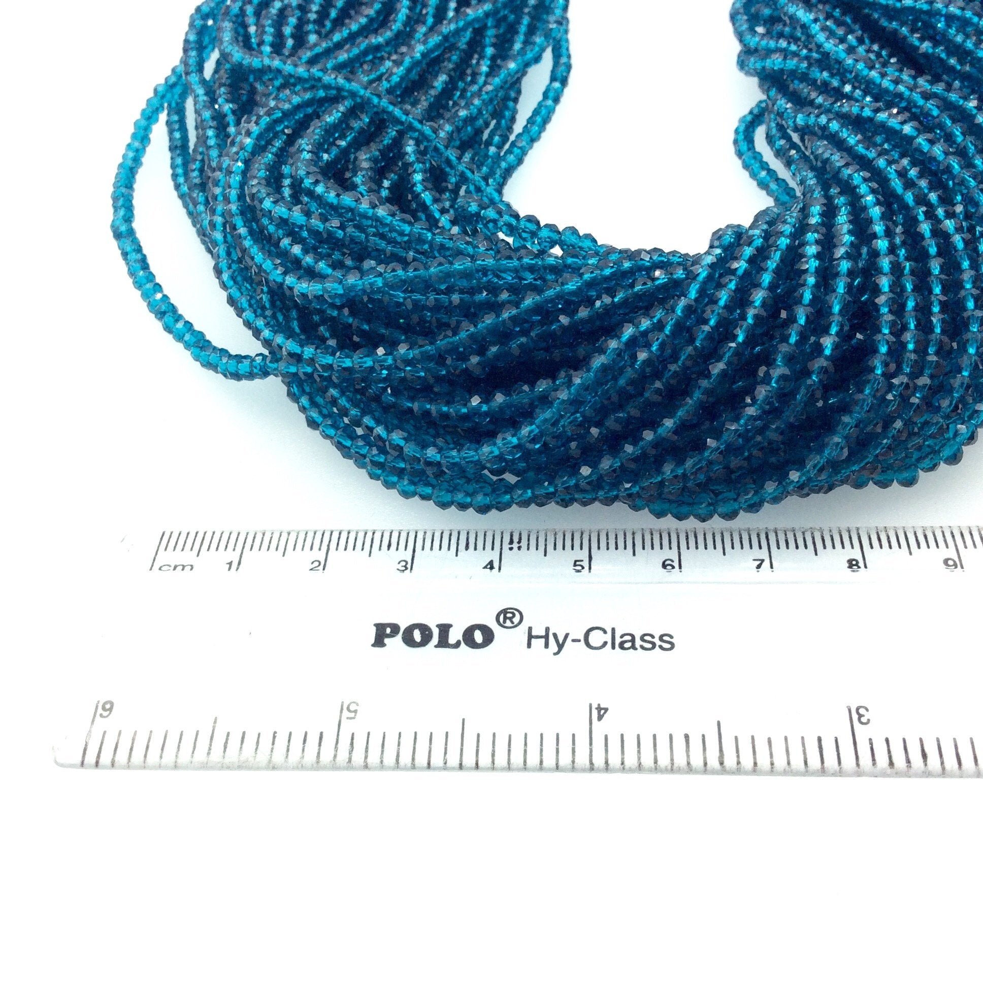 2mm x 3mm Faceted Tansparent Teal Blue Chinese Crystal Rondelle Shaped Beads - Sold by 16" Strands (Approx. 150 Beads)