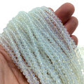 3mm x 4mm Glossy Finish Faceted Transparent Pale Celery Green Crystal Rondelle Shaped Beads - 19" Strand (Approx. 150Beads)