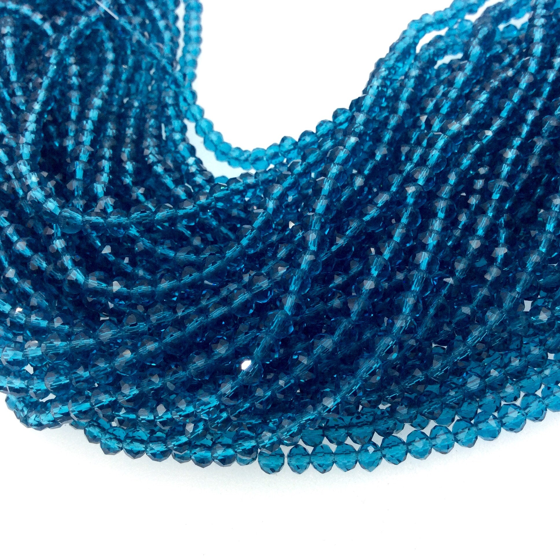 3mm x 4mm Glossy Finish Faceted Transparent Teal Blue Chinese Crystal Rondelle Beads - 16" Strand (Approx. 130 Beads)