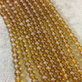 6mm Smooth Transparent Pearlescent Deep Yellow Ochre Glass Crystal Round/Ball Shaped Beads - 11.5" Strand ( Approx. 56 Beads per Strand)