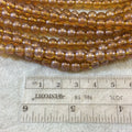 6mm Smooth Transparent Pearlescent Deep Yellow Ochre Glass Crystal Round/Ball Shaped Beads - 11.5" Strand ( Approx. 56 Beads per Strand)